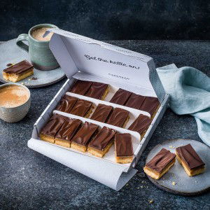 image of cake box delivery of vegan and gluten free caramel shortbread